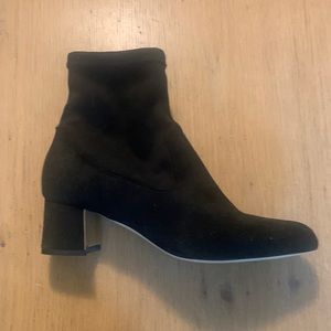 Black stretch suede booties with gold inside he’ll